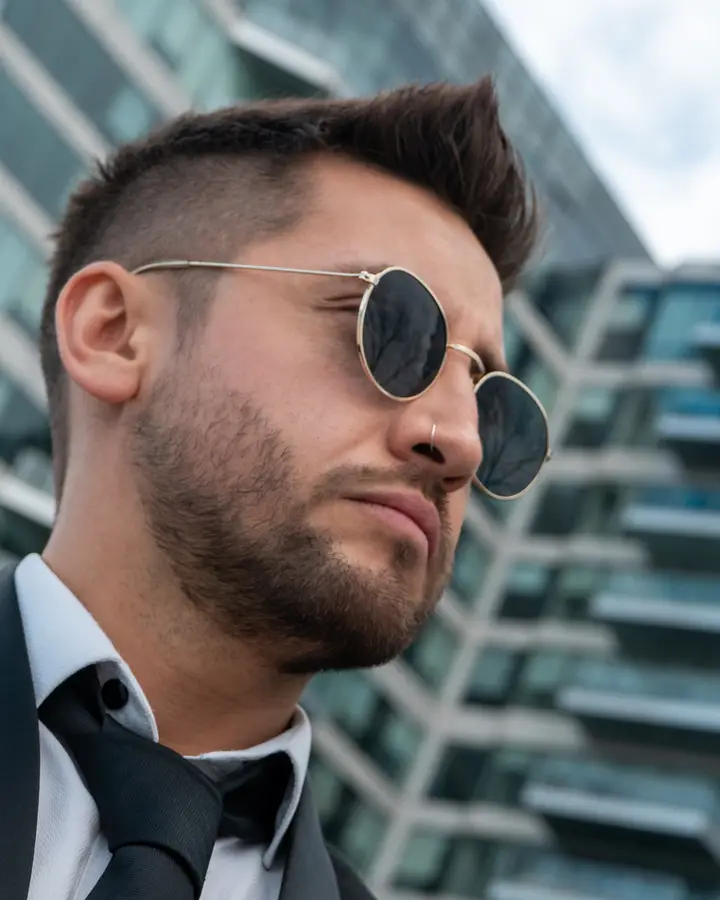 Nicko Guerrero in profile with sunglasses